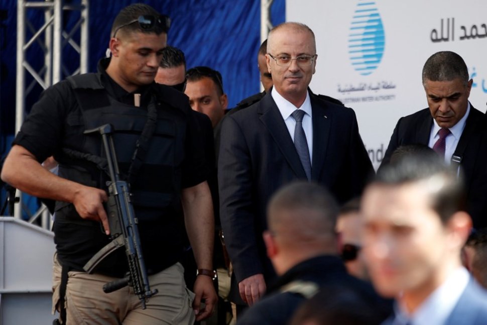 Palestinian prime minister: PM Hamdallah ,survives roadside bomb blast on convoy