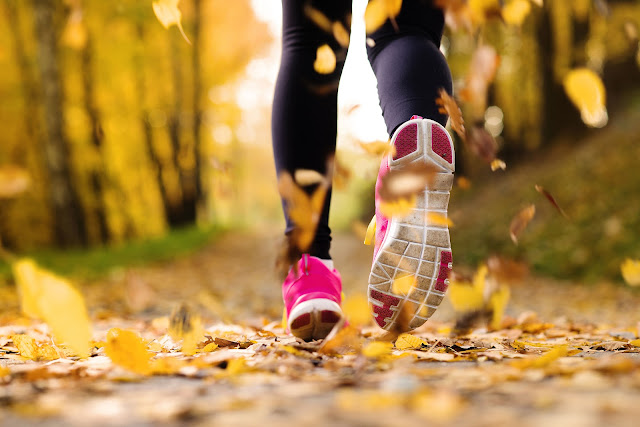 Runer running in leaves