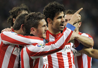 Los jugadores celebran el golazo de Koke