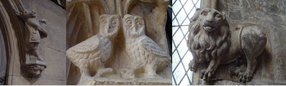 Animal carvings of owls and a lion in a church