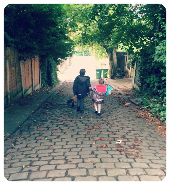 two children walking to school