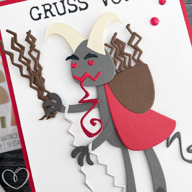 Card with Krampus made of Sizzix die cuts and cardstock with the sentiment "Gruss vom Krampus," or "Greetings from Krampus."