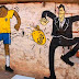 Artistas mostram insatisfação com a Copa do Mundo em grafites