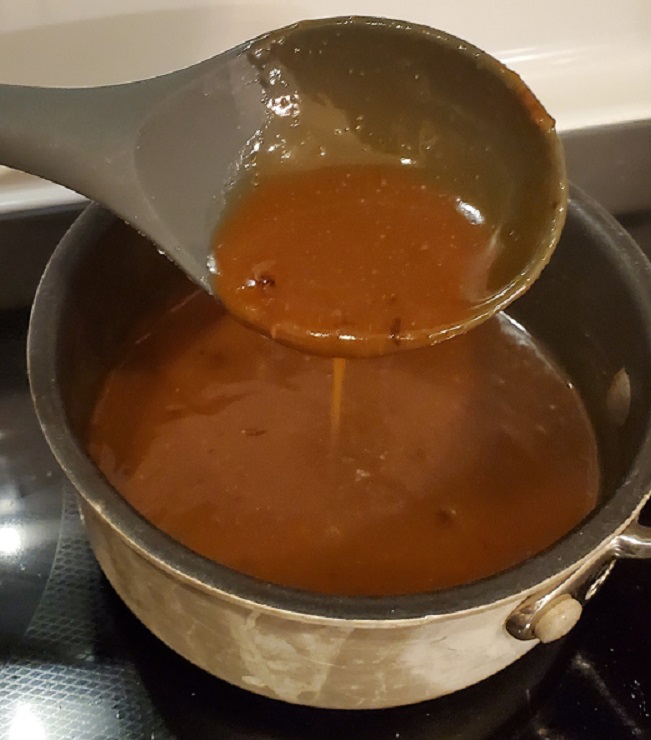 beef gravy in a sauce pan