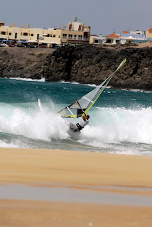 Nick Moffatt Windsurfing through the waves
