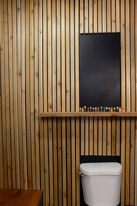 closer view of cedar slat wall in bathroom