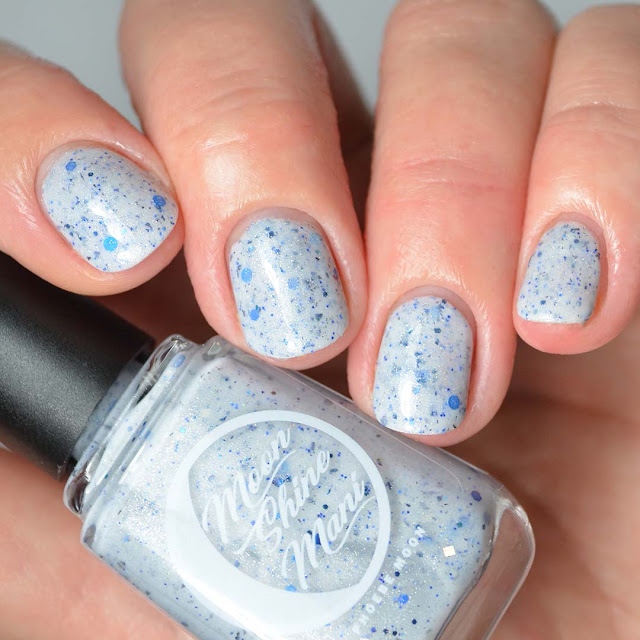 grey crelly nail polish with blue glitter swatch