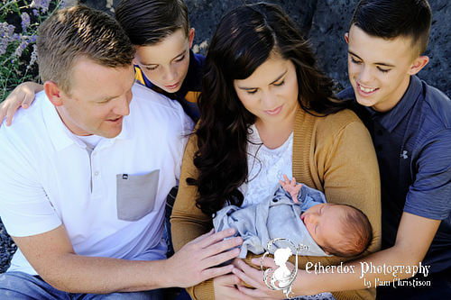 Professional portrait of a family with a newborn baby