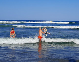 Going into the waves with Rosie