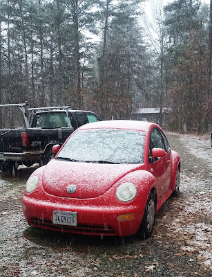 Red VW Beetle's first snow fall