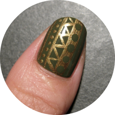  a while so today I made a detailed tribal pattern on a few accent nails
