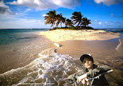 Desktop Wallpaper of Justin Bieber riding a bike bicycle in Beautiful Island . (justin bieber desktop wallpapers riding bike beautiful island)