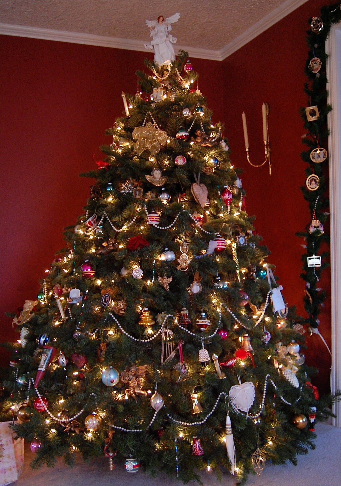 gold beads this year anywhere did not have any baby s breath on hand and I had to stretch our pearl beads as our tree is very big however