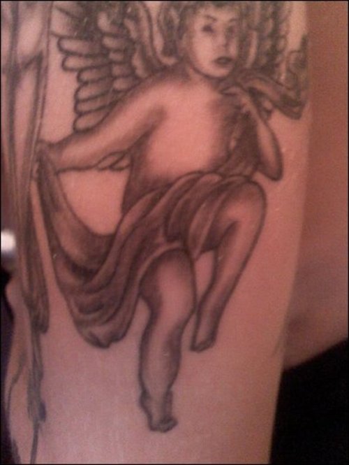 Cute cherub angel tattoo photo.