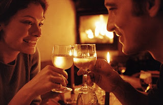 couple enjoying candle light dinner