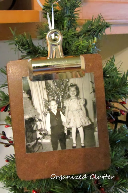 Photo of clipboard Christmas tree ornaments.