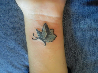 Nice Hand Butterfly Tattoo Designs