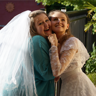 Sisters with Mum's Wedding Dress - Kristy and Katrina