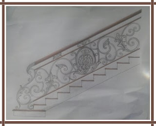 desain khusus railing tangga besi tempa klasik dengan perpaduan ornamen besi tempa khusus