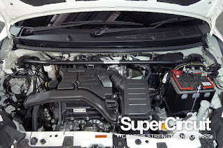 The engine bay of the Perodua Axia 1.0 with the SUPERCIRCUIT Front Strut Bar installed.
