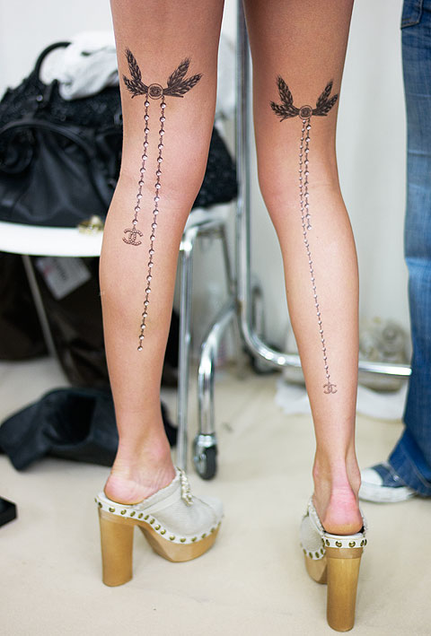 bow tattoos on legs