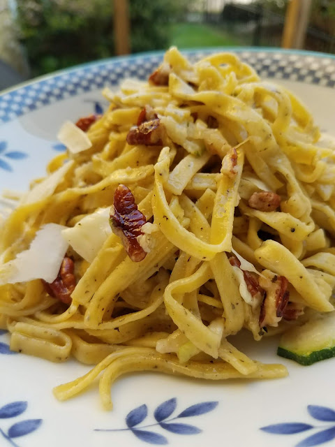 Fettucine, Pecans, Zucchini and Shaved Parmesean make for an easy all-in-one meal. Add tofu, chicken, seafood for more protein. 