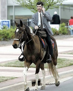 funny pics riding to work ride horse cell phone