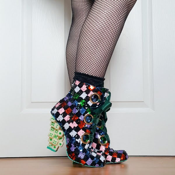 wearing Irregular Choice dice heel boots