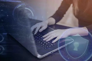 Image of a person on laptop | Quantum Cybersecurity