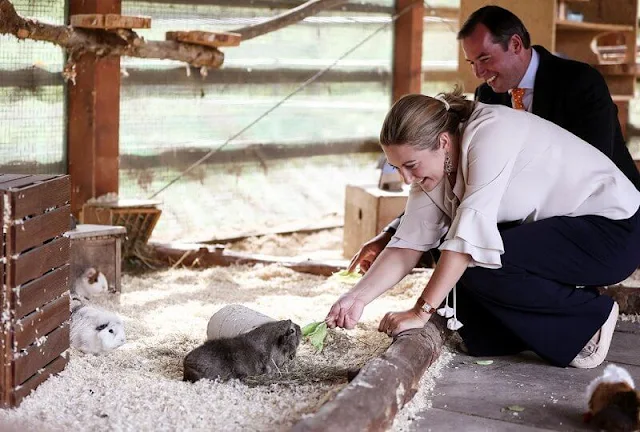 Princess Stephanie wore a ruffle sleeve blouse from Paule Ka. Hereditary Grand Duke Guillaume and Hereditary Grand Duchess Stephanie