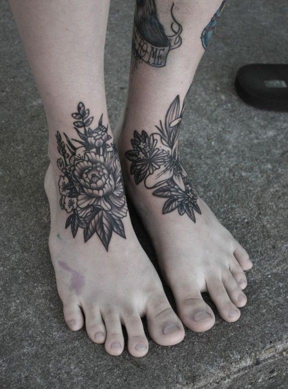 Black and grey flowers tattoo on feet by Baylen Levore