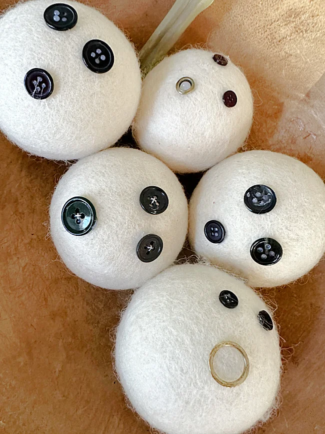 dryer ball ghosts with hardware faces