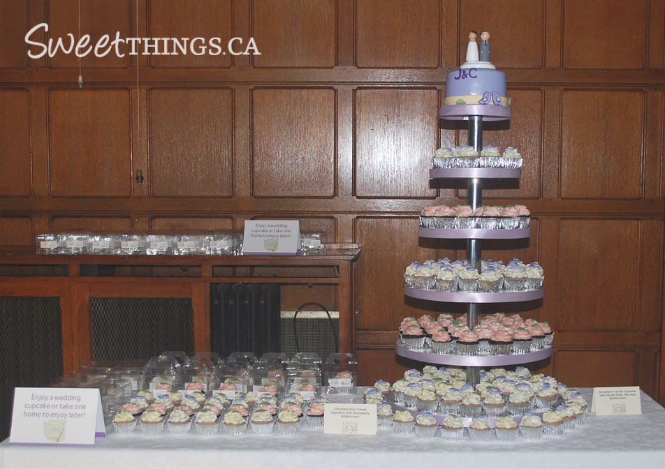 This wedding cupcake tower was decorated with some sugarpaste bees and 