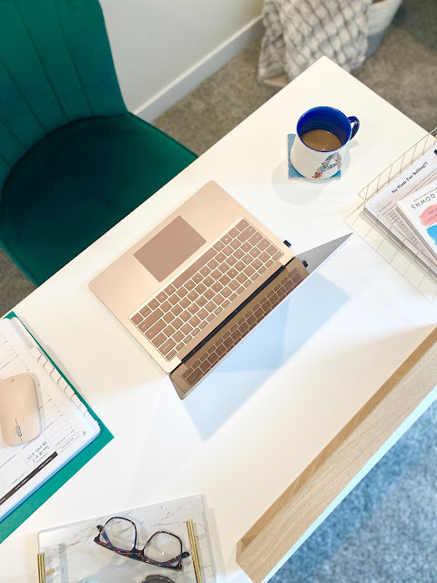 Aerial view of home office desk.