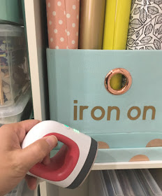 Ideas for organizing a small craft room using Cricut vinyl