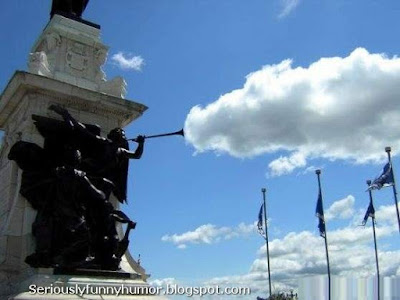 Statue blowing cloud - funny coincidence