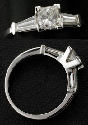 princess cut diamond solitaire with tapered baguette diamonds