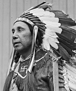 William Neptune, leader of the Passamaquoddy Nation, wearing a swastika.