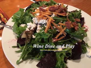 the rebel roquette salad stack at CIP's Place on Sanibel Island, Florida. It had arugula and mixed greens salad tossed in a pear vinaigrette topped with candied pecans, bleu cheese, roasted beets, and crispy sweet potato hay. The tart flavors and texture of the arugula went very well with the sweet tones of the pairs and vinegar, match with lightly potent blue cheese, made wonderful undertone to the start of the meal.