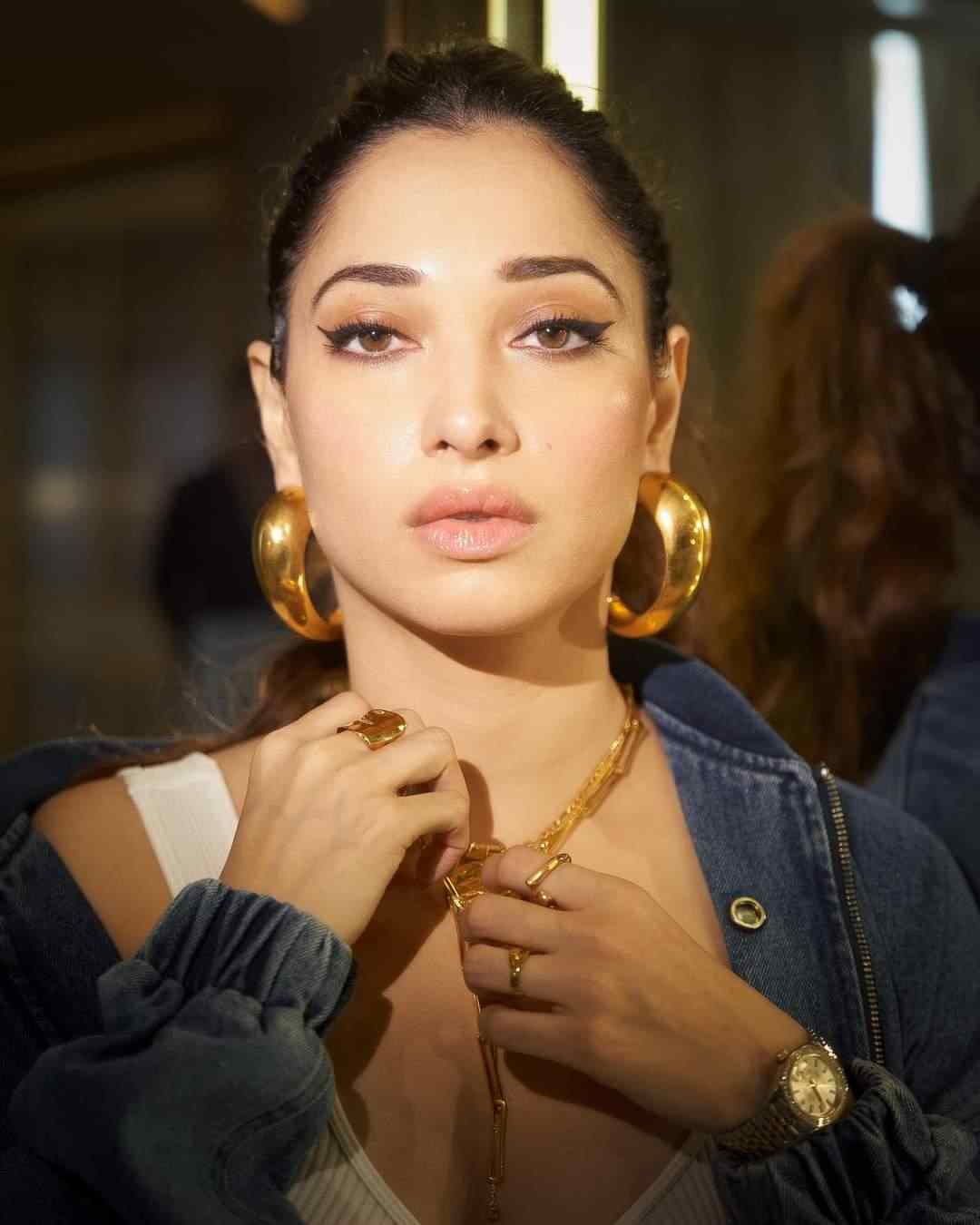 Tamannaah Bhatia,Tamannaah Bhatia in a sexy bralette and heart pattern black pants, Tamannaah Bhatia hot sexy photos, Tamannaah Bhatia xxx, Tamannaah Bhatia bikini, Tamannaah Bhatia boobs, Tamannaah Bhatia hot xxx video download, fashion, floral-appliquéd jersey flared-leg black pants and flower applique bustier-style black top