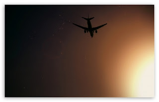 Flying Airplane At Night