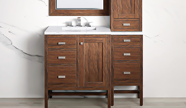 Dark wood single vanity with drawers on two sides by James Martin.