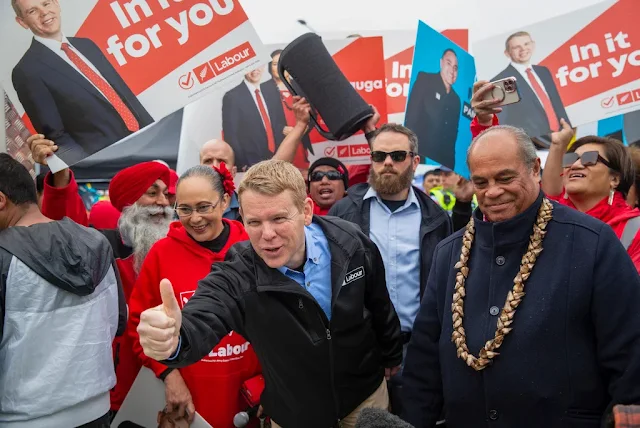 Cover Image Attribute: In August 2023, Chris Hipkins, the Prime Minister of New Zealand, was captured in a photograph making gestures during a campaign visit to the Otara markets in Auckland. / Source: New Zealand Herald/AP