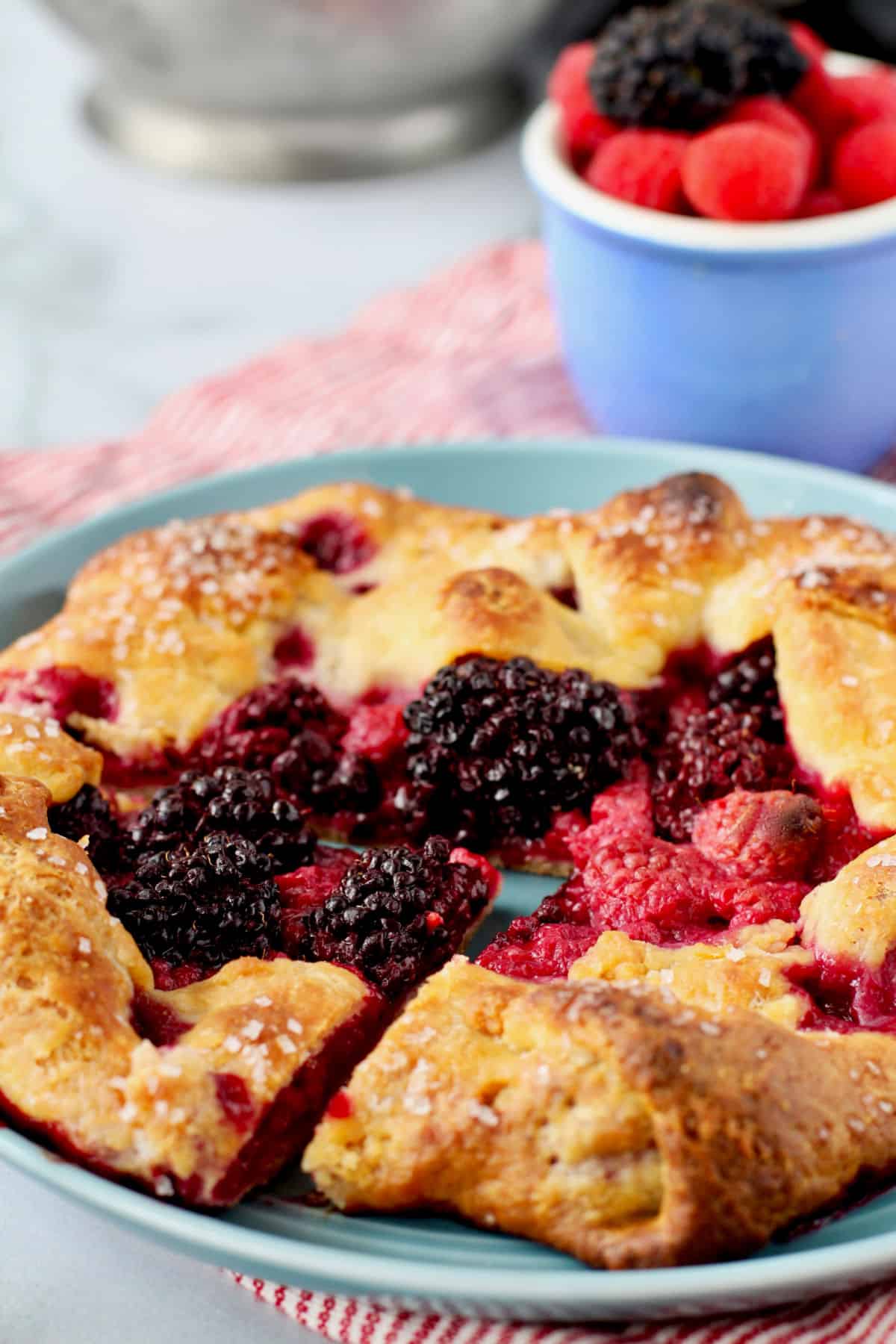 Berry Galette on a blue plate.