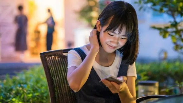 Chinese girl using smartphone