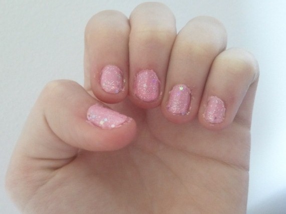 pink nail polish with silver glitter