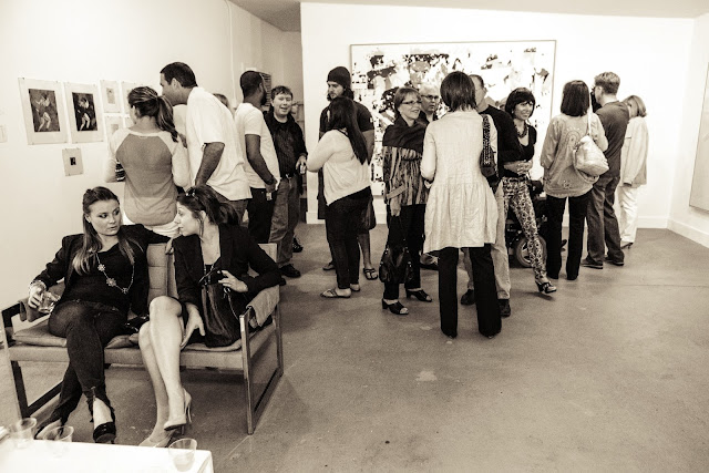 Photo of people at Theo Wujcik: On a Clear Day art exhibition at Tempus Projects