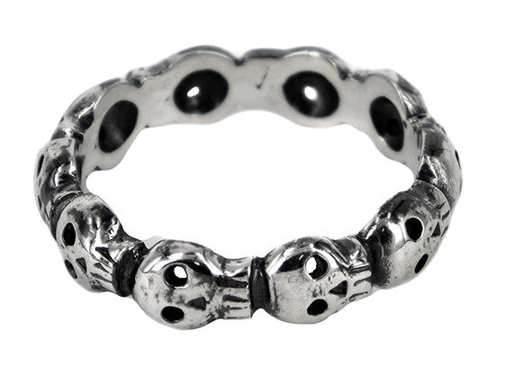 10 Skull eternity ring in sterling silver by Justine Austen