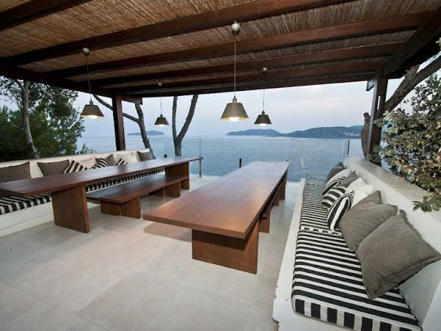 Wooden tables on the terrace