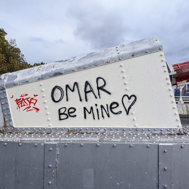 Some graffiti on Chelsea Bridge that reads: Omar be mine.